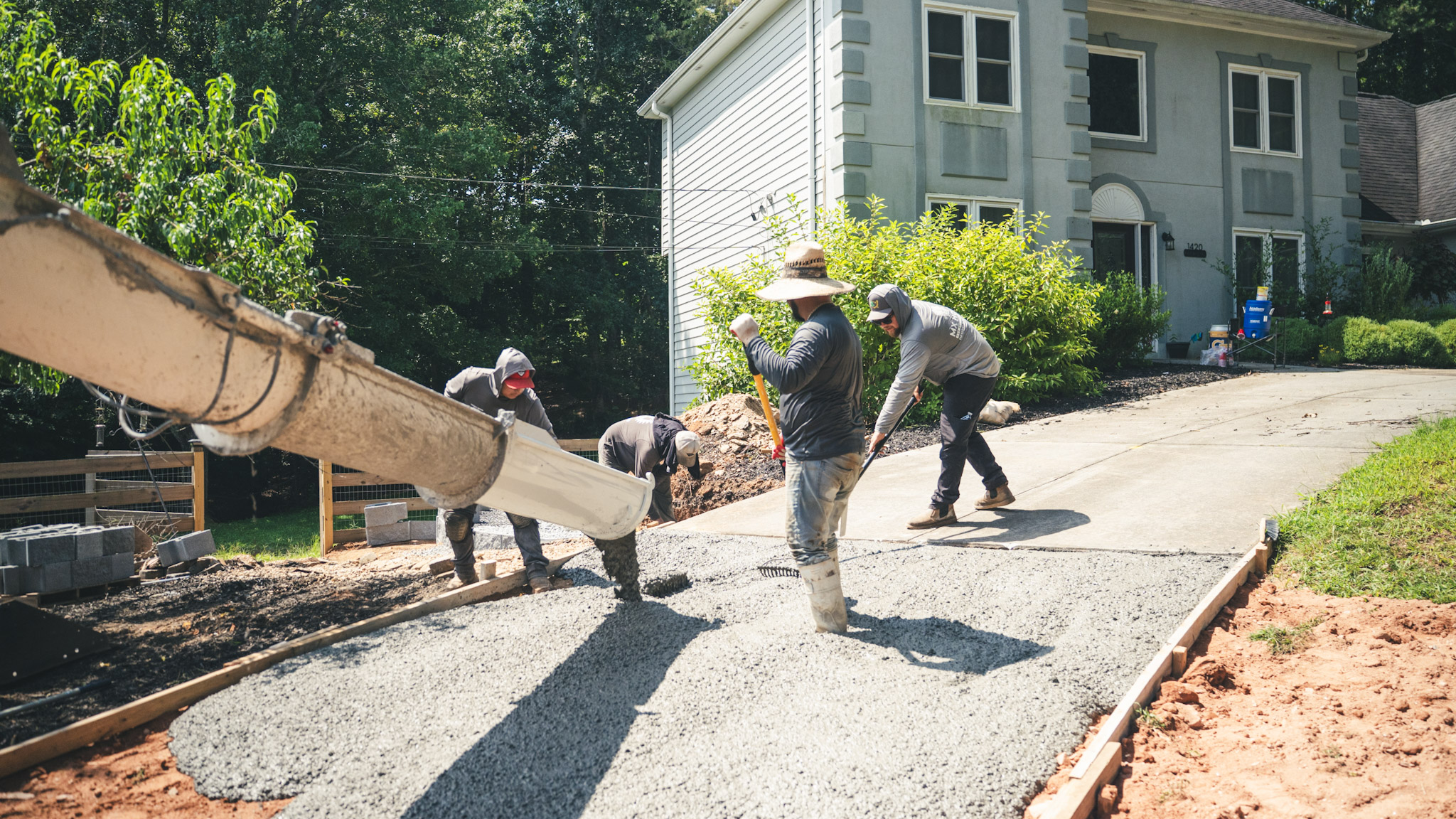 MX House crew completing a large concrete project