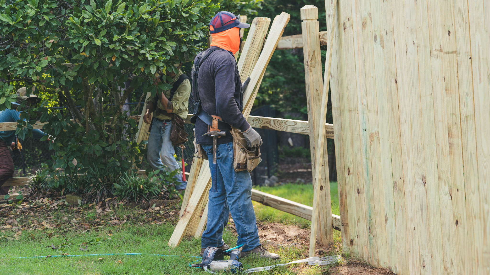 MX House fence installation in progress